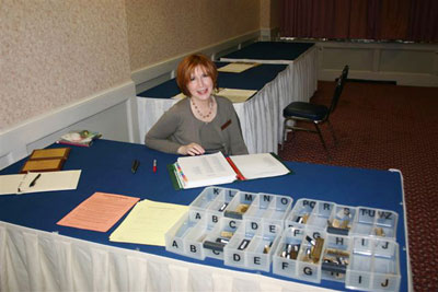 Chapter Secretary-Treasurer Michele Zabel greets all attendees.