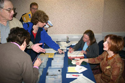 As usual the sign-in table is the busiest place at our meetings. The chapter will miss seeing Michele in her roles as she retires from being both Secretary and Treasurer for several years.