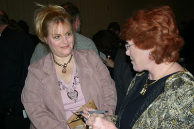 Kathy Refai and Kathleen Ewell discuss bidding strategies.