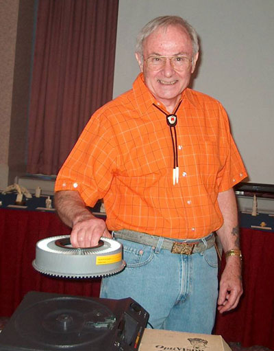 Ivory expert Bobby Mann prepares his slides.